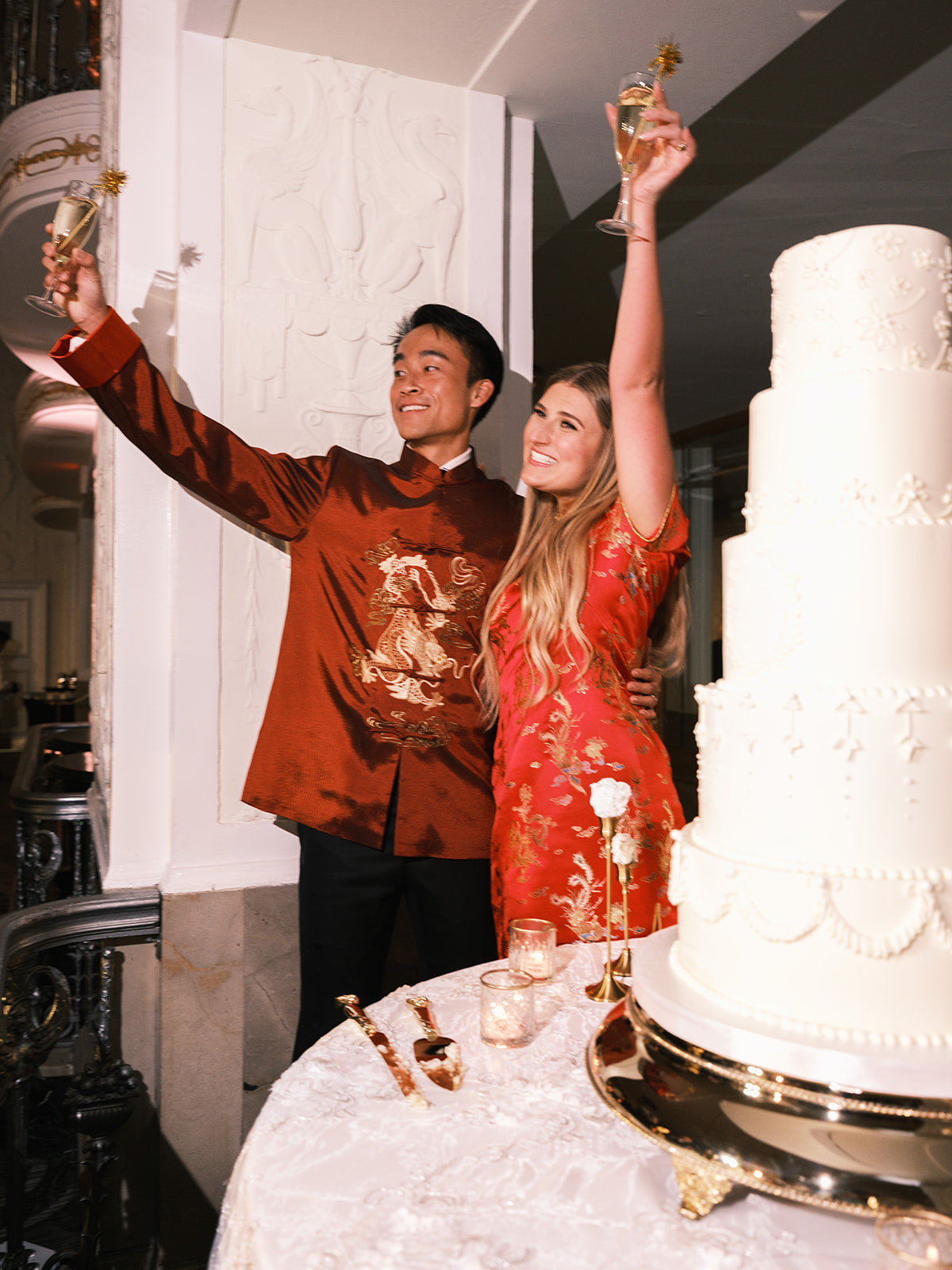 bride and groom cutting the cake